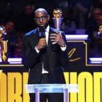 Andre Iguodala speaks at center court during his jersey retirement ceremony on Sunday. Iguodala lauds 'unique' Warriors as Dubs retire No.9 jersey