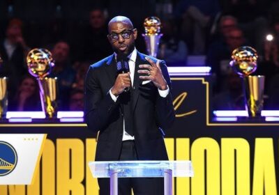 Andre Iguodala speaks at center court during his jersey retirement ceremony on Sunday. Iguodala lauds 'unique' Warriors as Dubs retire No.9 jersey