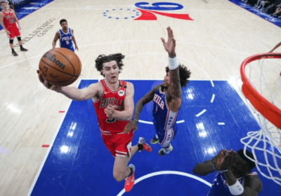 Chicago Bulls guard Josh Giddey (left, 3), drives for a layup against Philadelphia 76ers' forward Kelly Oubre(right) during their match on Monday. 76ers vs Bulls marks another missed game for Embiid