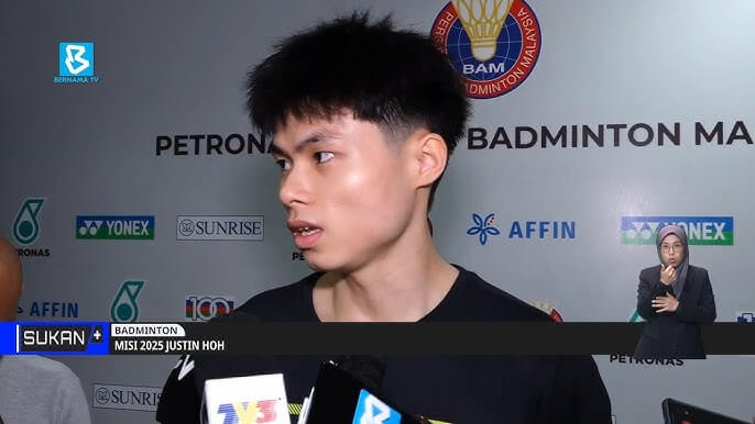 Malaysia's Justin Hoh fields questions at an interview in file photo. Malaysian shuttler claims German Open main draw, avoids qualifier