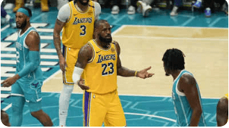 Los Angeles Lakers forward LeBron James reacts to a call in thir game against the Charlotte Hornets on Wednesday. Lakers vs Hornets game sees James' return