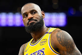 Los Angeles Lakers forward LeBron James looks on at a recent Lakers' game in file photo. NBA All-Star Game to miss James for first time after 20-year run