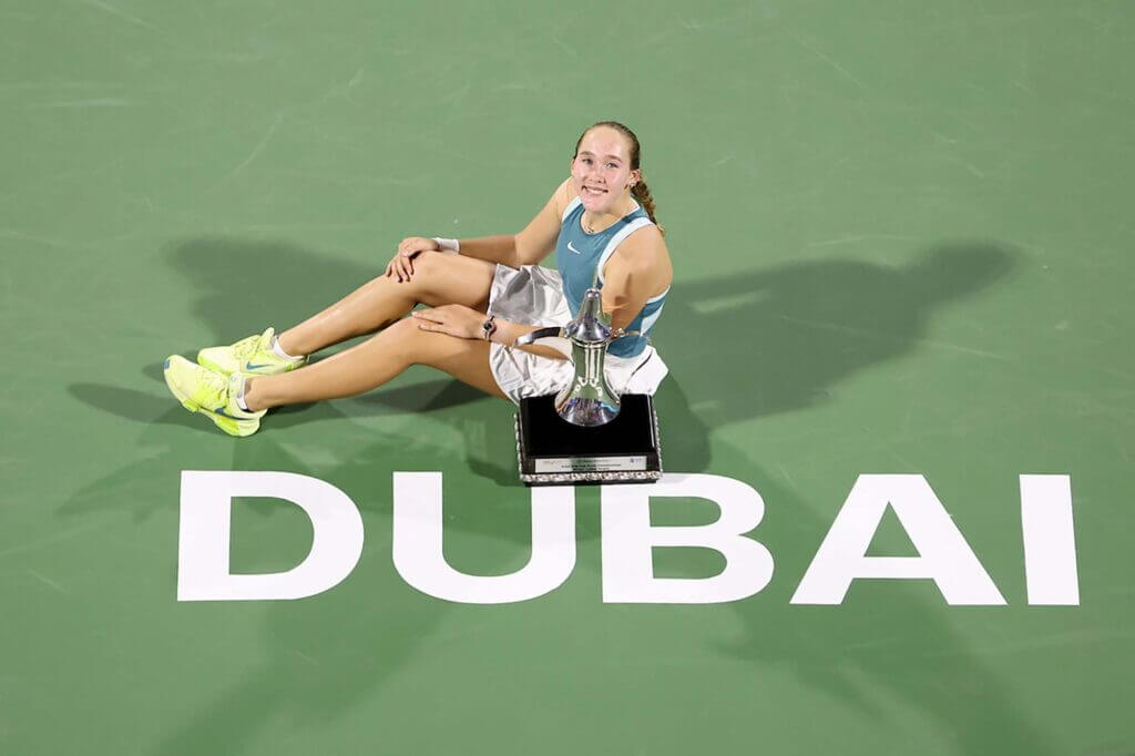 Russia's Mirra Andreeva poses with her trophy after winning the Dubai Championships title on Saturday. Andreeva reaches WTA rankings top 10 as teener