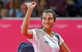 India's PV Sindhu waves to a crowd at a recent tournament in file photo. Shi, An continue to lead latest BWF rankings; Sindhu drops to 15th