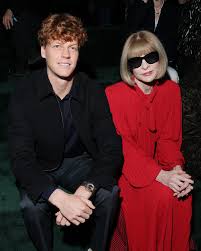 Italy's Jannik Sinner poses for photographers with Anna Wintour, editor-in-chief of Vogue Globaat the Milan Fashion Show for Gucci on Tuesday. Sinner makes appearance at Gucci show for first time since ban 