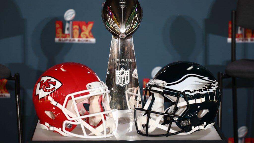 Helmets from the Kansas City Chiefs (left, in red and white) and the Philadelphia Eagles (in white and green) were placed side by side with the Vince Lombardi Trophy (middler) as Super Bowl LIX unfolds in New Orleans, Louisiana, on Sunday. Super Bowl LIX meme compares title game to Messi, Ronaldo fame