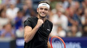 American Taylor Fritz pumps his fist at a US Open 2024 match in file photo. Fritz, Rune may play US Open mixed doubles after format change