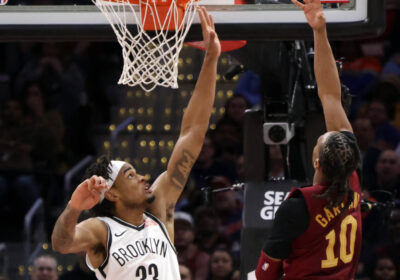 Cleveland guard Darius Garland (10, right) drives for a layup againdt Brooklyn big man Nic Claxton (33, left) in their game in Cleveland on Tuesday. Cavaliers vs Nets game gets Cleveland second 15-game win streak