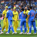 Players from Australia (in yellow) and India (in blue) shake hands after their Champions Tropphy 2025 match in Dubai pmn Tuesday. India reaches Champions Trophy 2025 final after beating Australia