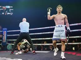 Japan's Naoya Inoue (right) pumps his fist after knocking out his opponent in a recent fight in file photo. Inoue eyes Cardenas for May bout after Picasso backs out