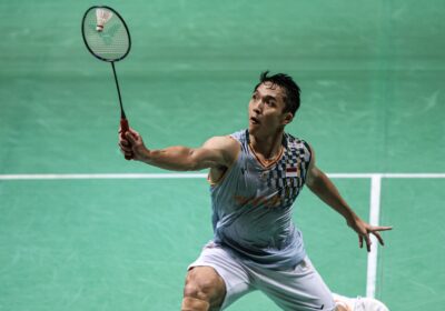 Indonesia's JKonatan Christie takes a shot in his match against Malaysia's Leong Jun Hao in Birmingham on Tuesday. All England Open 2025 sees Christie beat Leong