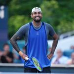 Australia's Nick Kyrgios smiles as he takes a short break during his opening round match against Mackenzie McDonald in South Florida on Wednesday. Kyrgios gets past McDonald at Miami Open