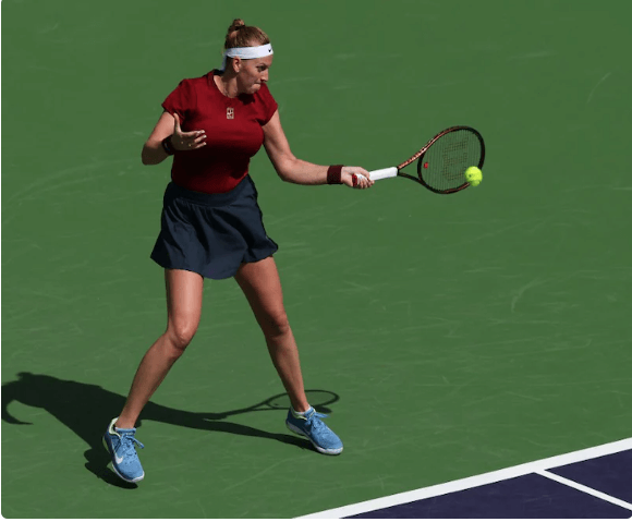 Czech Republic's Petra JKvuitiova hits shot in her return to Indian Wells on Wednesday. Japan's Naomi Osaka returns a shot in her return at Indian Wells on Tuesday. Osaka, Kvitova lose in Indian Wells