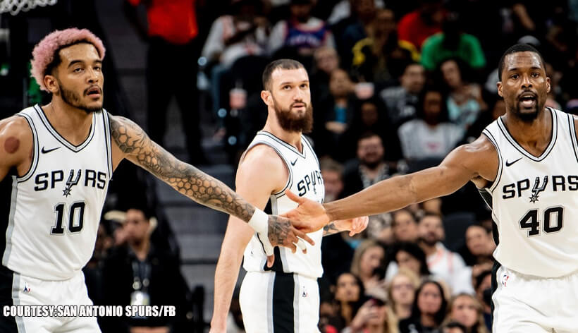 San Antonio forward Sandro Mamukelashvili  (middle) is flanked by teammatesa Jeremy Sochan (ledft) and Harrison Barnes (right) in his team's game against the New York Knicks on Wednesday. Spurs vs Knicks sees San Antonio post upset