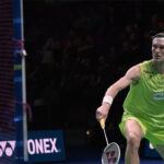 Denmark's Viktor Axelsen hits a shot against singapore's Loh Kean Yew in their finals match on Sunday. Axelsen takes German Open title, beats Loh in final