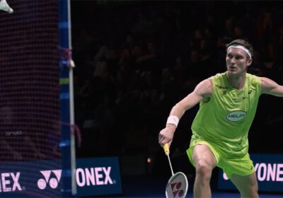 Denmark's Viktor Axelsen hits a shot against singapore's Loh Kean Yew in their finals match on Sunday. Axelsen takes German Open title, beats Loh in final