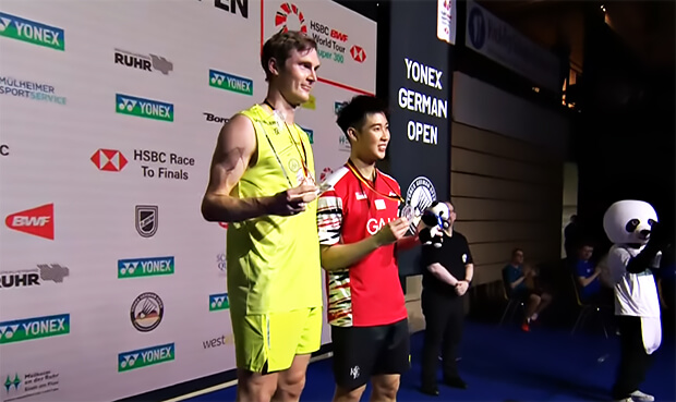 Denmark's VIktor Axelsen (left) shares the stage wiyh Singapore's loh Kean Yew (right) after their final match on Sunday. Axelsen takes German Open title, beats Loh in final