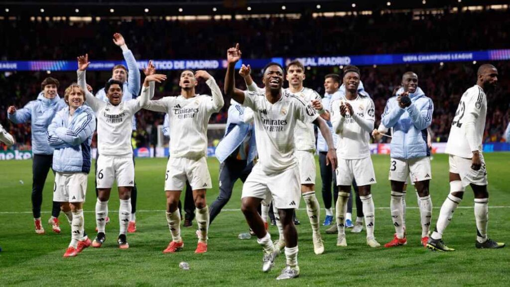 Real Madrid players celebrated after edging Atletico Madrid by shootout