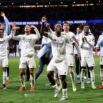 Real Madrid players celebrated after edging Atletico Madrid by shootout