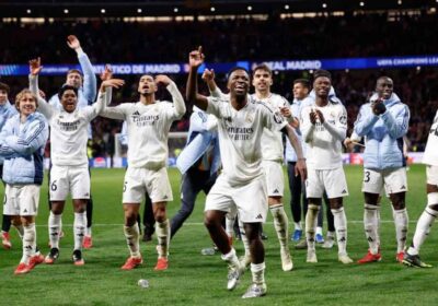 Real Madrid players celebrated after edging Atletico Madrid by shootout