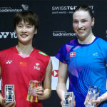 China's Chen Yufei (left) and Denmark's Line Hojmark Kjaersfeldt disolay their trophies at the women's singles awarding ceremony on Saturday. 2025 Swiss Open finals saw Weng, Chen claim China double