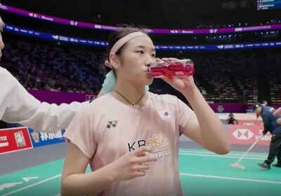 Women's singles world No.1 An Se-young takes a drink after her match at the Sudirman Cup in Xiamen, China, on Monday. An helps South Korea in win over Canada in Sudirman Cup 2025