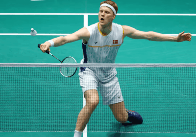 Denmark's Anders Antonsen slides in for a shot against hS Prannoy in their Sudirman Cup 2025 match in Xiamen, China, on Sunday. Sudirman Cup 2025 opener sees Antonsen-led Denmark drop India