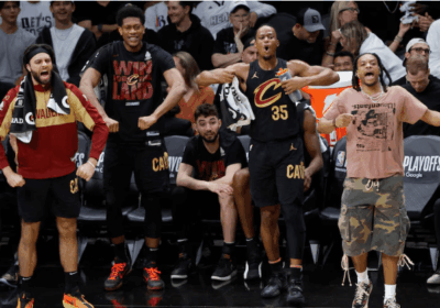 Players from the Clevelnd Cavaliers celebrate from the bench in Game 4 of their first round series against the Heat in Miami on Monday. Cavs vs Heat series ends with 55-point rout as Cleveland advances