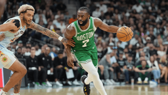 Boston forward Jaylen Brown (7, right) maneuvers to look for a shot against the Orlando Magic in Game 2 of their series on Wednesday. Celtics vs Magic has Brown's 36 leading Boston in win sans Tatum