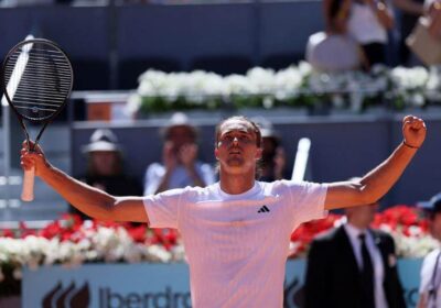 Germany's Alexander Zverev stretched his arms in celebration after his Madrid Open match on Sunday. Zverev seeks rule change after win; Madrid matches suspended