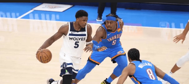 Minnesota guard Anthony Edwards (5, left) to get past two OKC defenders in Game 2 of their best of seven series on Thursday. OKC vs Wolves Game 2 sees Thunder take 2-0 lead behind SGA
