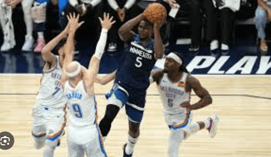 Minnesota guard Anthony Edwards (5, middle) shoots over three OKC defenders in Game 5 of their Western Conference Finals series on Wednesday. Thunder vs Wolves has OKC set to 'buckle up' for NBA Finals 