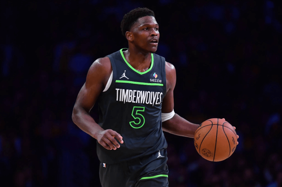 Minnesota guard Anthony Edwards dribbles the ball in his team's first round series against the Golden State Warriors in Game 1 on Tuesday. Timberwolves vs Warriors sees Dubs take Game 1 as Curry injured