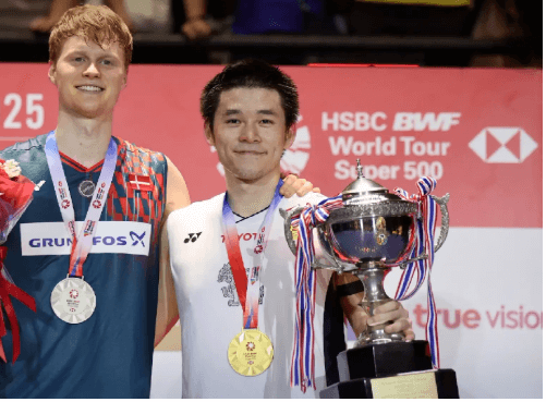 Kunlavut Vitidsarn (right) and Denmark's Anders Antonsen (left) display their trophies as they pose for the cameras ater their Thailand Open 2025 men's singles final against Denmark's Anders Antonsen on Sunday Kunlavut wins Thailand Open 2025 title; Chen gets women's crown