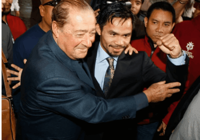 Top Rank executive Bob Arum (left) joined Manny Pacquiao (right) at a formal event in file photo. Arum finds Pacquiao comeback title fight 'really questionable'