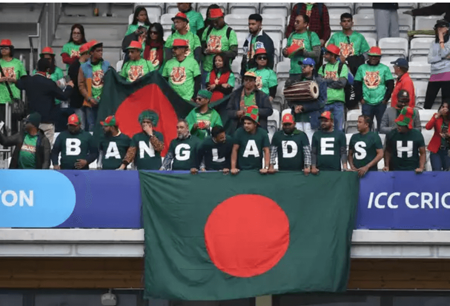 A horde of Bangladesh cricket fans wear shirts spelling out their home country in support of their team in file photo. BCB gets nod from Bangladesh govt to play cricket in Pakistan