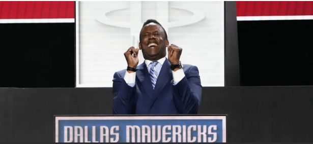 NBA legend Rolando Blackman pumps his fists as he reacts after NBA deputy commissioner Mark Tatum announced that the Dallas Mavericks won the No.1 pick in the 2025 NBA Draft lottery on Monday. Cooper Flag to Texas after Mavs win NBA draft lottery