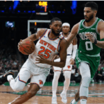 New York Knicks forward Mikal Bridges (25, left) drives against Boston Celtics forward Jayson Tatum (0, rght) in Game 2 of their first round series on Wednesday. Celtics vs Knicks sees New York get 2-0 lead after comeback win