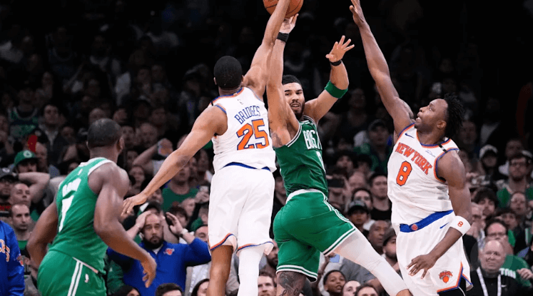 New York Knicks forward Mikal Bridges (25, left) defends against Boston forward Jayson Tatum (0, middle) in Game 2 of their first round series on Wednesday. Celtics vs Knicks sees New York get 2-0 lead after comeback win