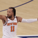 New York pointguard Jalen Brunson raises his arms to egg on the crowd in Game 5 of their Eastern Conference finals series vs the Indiana Pacers on Thursday. Knicks vs Pacers series sees New York force Game 6