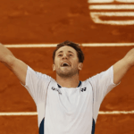 Norway's Casper Ruud raises his arms in celebration after his Madrid Open final against Britain's Jack Draper on Sunday. Ruud returns to top 10 after Madrid Open victory;