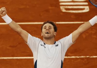 Norway's Casper Ruud raises his arms in celebration after his Madrid Open final against Britain's Jack Draper on Sunday. Ruud returns to top 10 after Madrid Open victory;