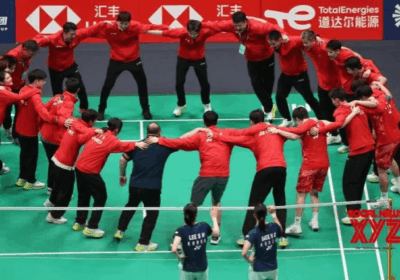 Members of China's national team form a circle and delebrate after their final against South Korea at the Sudirman Cup in Xiamen on Sunday. China dominates South Korea to win 4th Sudirman Cup title