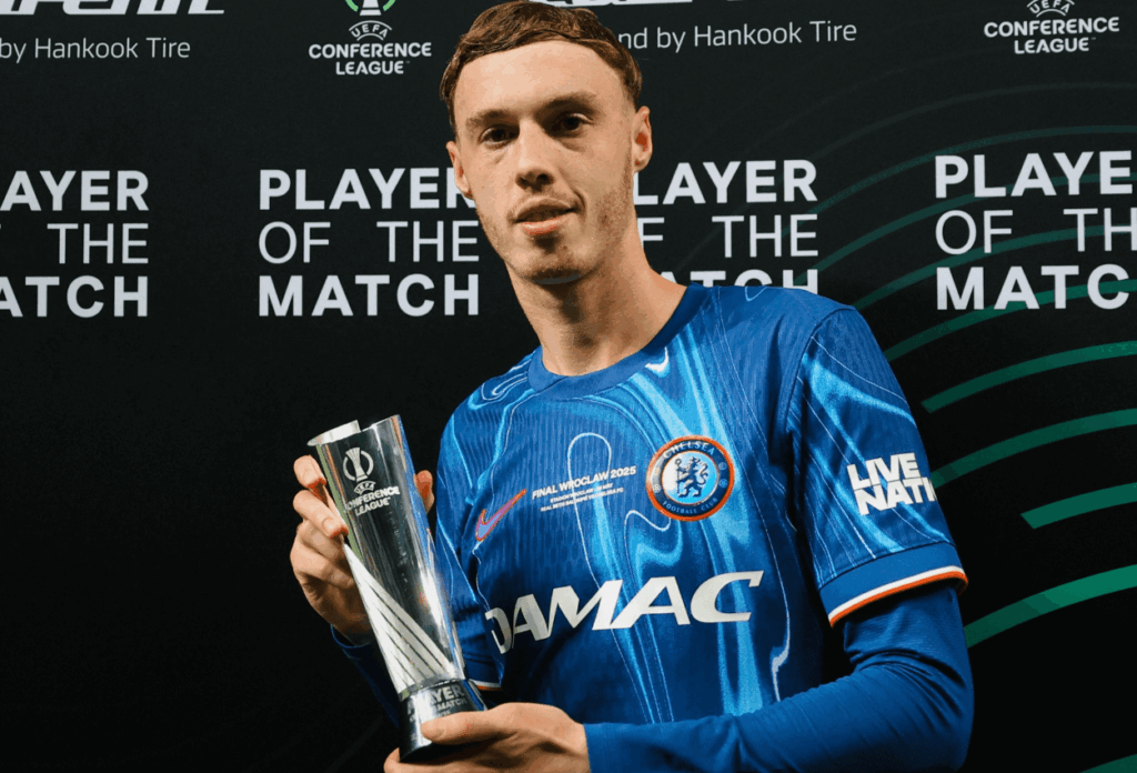Midfielder Cole Palmer holds a trophy as he was adjudged Player of the Match for helping Chelsea win the UEFA Conference League title on Wednesday. Real Betis vs Chelsea saw Blues claim UEFA Conference League
