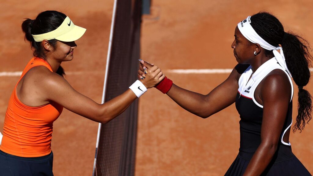 American Coco Gauff (right) and Britain's Emma Raducanu (left) shake hands at center court after their match at the Italian Open on Monday. Sinner resumes surge at Italian Open; Gauff takes down Raducanu