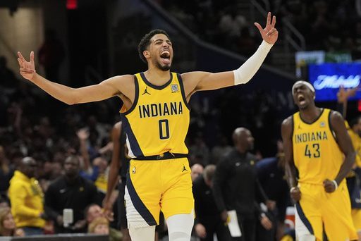 Indiana Pacers forward Tyrese Haliburton (0, middle) raises his arms in celebearion as teammate Myler Turner (43, right) shares his sentiments in Game 5 of their second round series against the Cleveland Cavaliers on Tuesday. Cavaliers vs Pacers series ends as Indiana takes Game 5