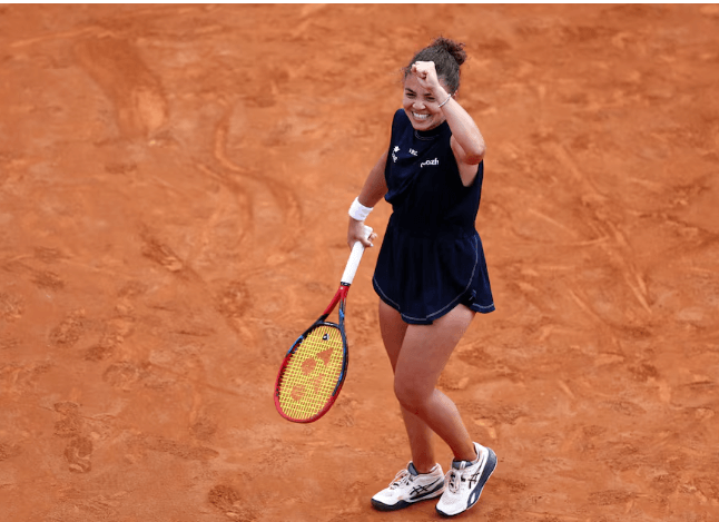 Italy's Jasmine Paolini pumps her fist as she acknowledges the crowd's support in her Italian Open match against Diana Shnaider on Tuesday. Spain's Alcaraz tops Khachanov at Italian Open; Sinner, Paolini advance