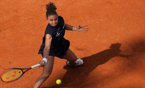 Italy's Jasmine Paolini tretches for a shot during her semifinals match against Peyton Stearns in Rome on Thursday. Paolini reaches Italian Open final vs Gauff; Sinner, Musetti in semis