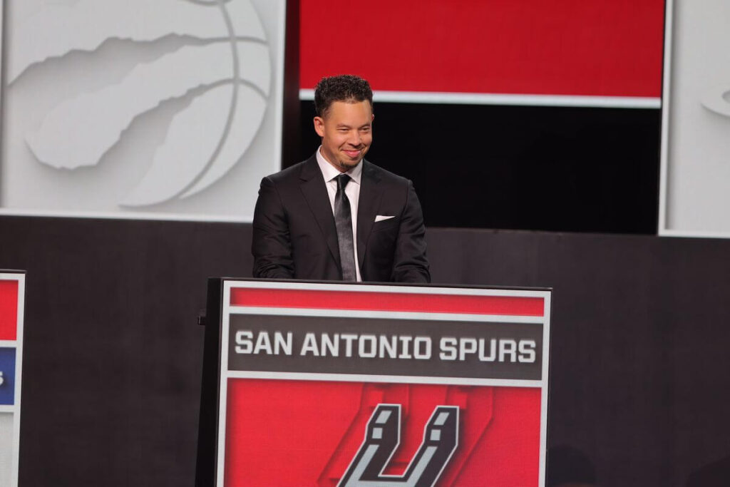 San Antonio Spurs coach Mitch Johnson was all smiles after his team took the No.2 spot in the 2025 NBA draft lottery on Monday. Cooper Flag to Texas after Mavs win NBA draft lottery; Spurs 2nd