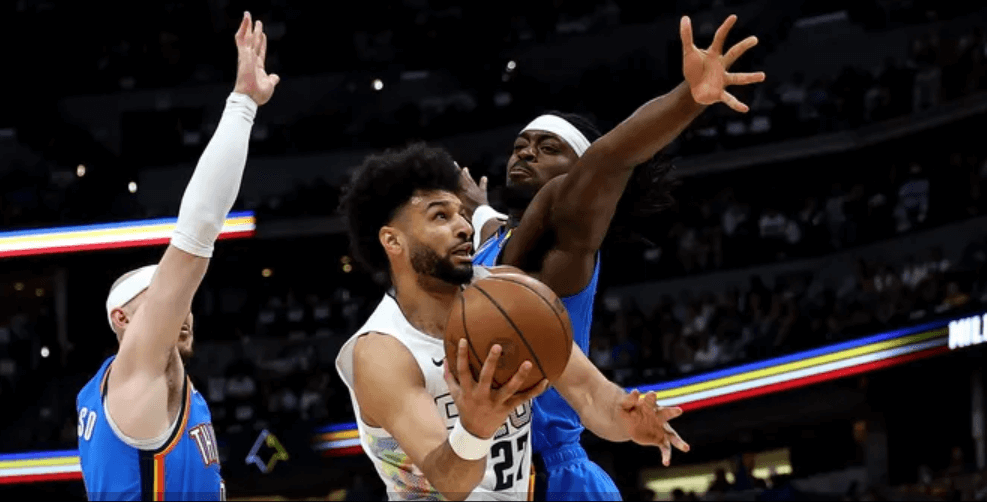 Denver guard Jamal Murray (middle) drives against two OKC defenders in Game 6 of their conference semifinals against OKC despite nursing an illness hours before the game. Nuggets vs Thunder sees Denver tie series amid Murray illness